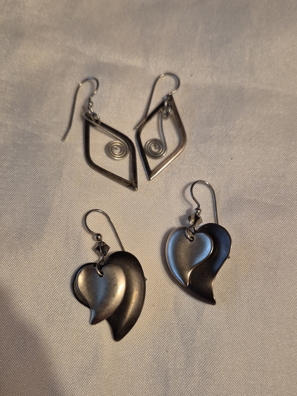 2 Pair Of Silver Dangle Earrings